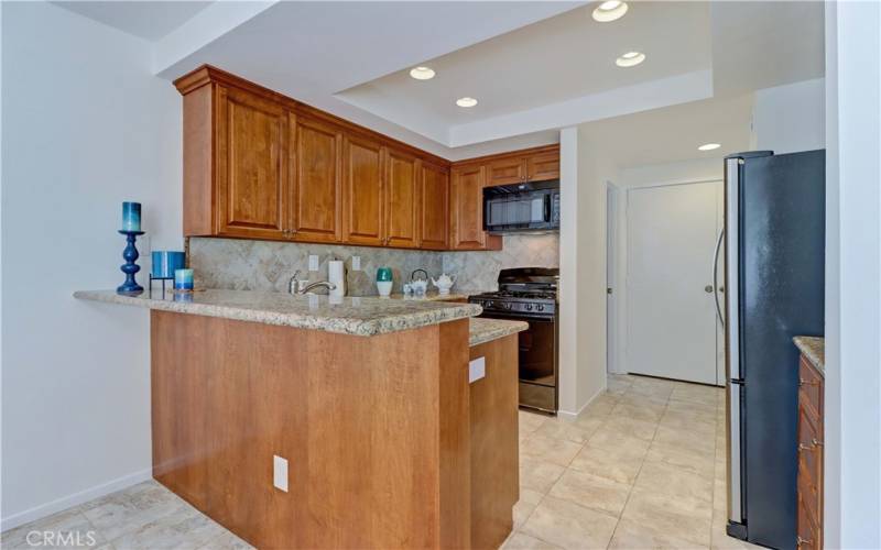 Bar area in dining room with room for bar stools. Kitchen has been upgraded.