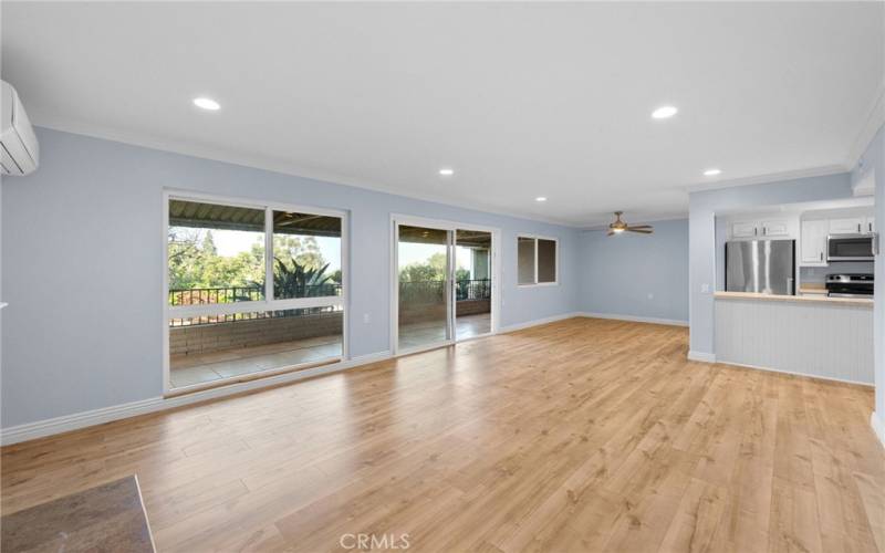 View of living room, dining area and kitchen