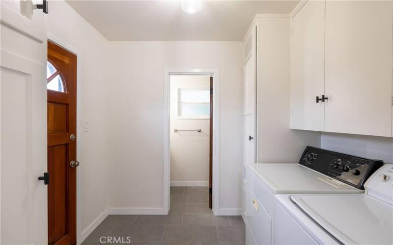 Laundry room with second half bath