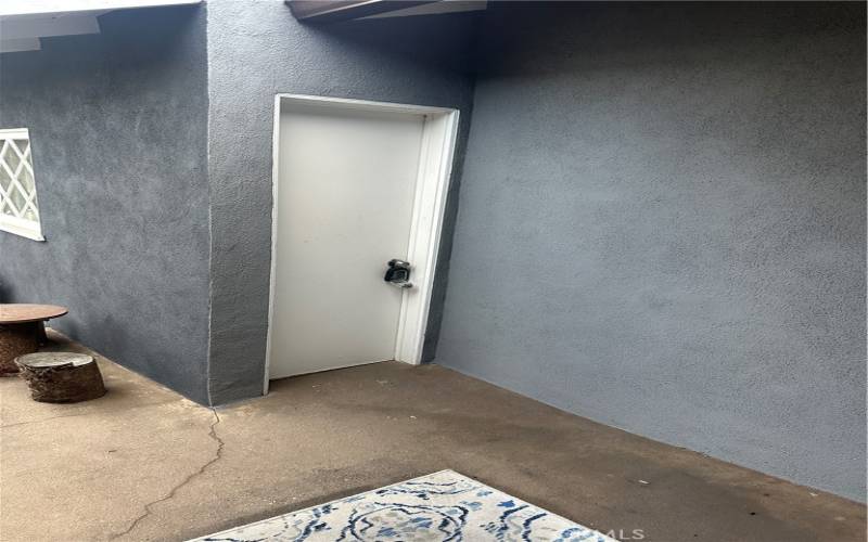 Access to covered front porch from garage