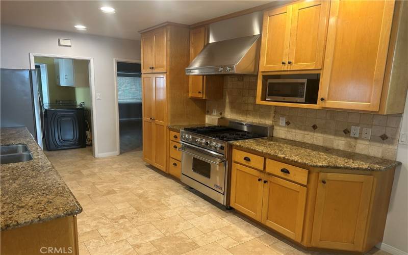 Maple cabinetry with granite tops