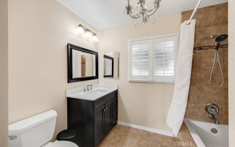 Remodeled hallway full bath.