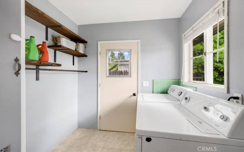 Large laundry room. Access to dog run in the backyard.