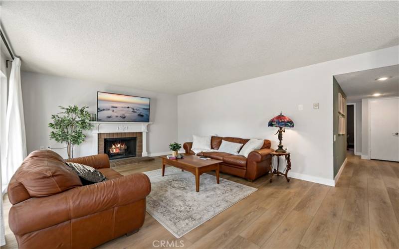 Living Room with updated vinyl large plank flooring