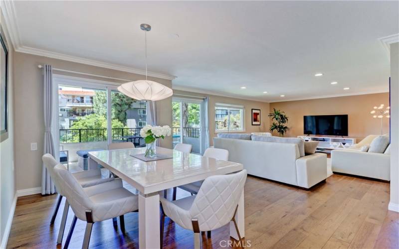 Dining Area & Double Pane Sliding Glass Doors to Balcony