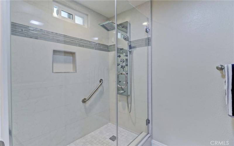 Primary Bathroom Shower with Window Above