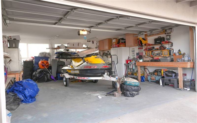 2 car garage with work shelves