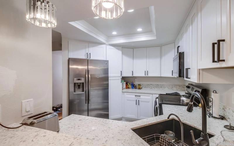 Beautiful kitchen with very nice refrigerator