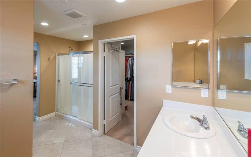 Master bath with walk in shower and walk in closet