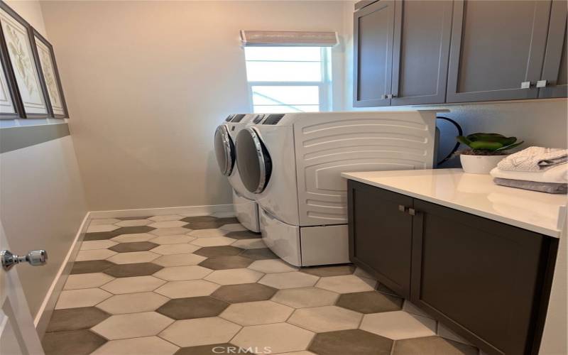 Laundry room with storage and folding