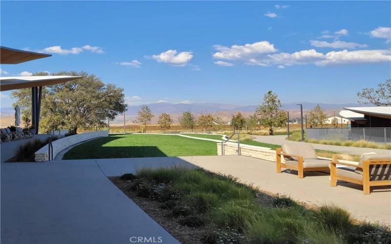 Community space with trails and mountain views