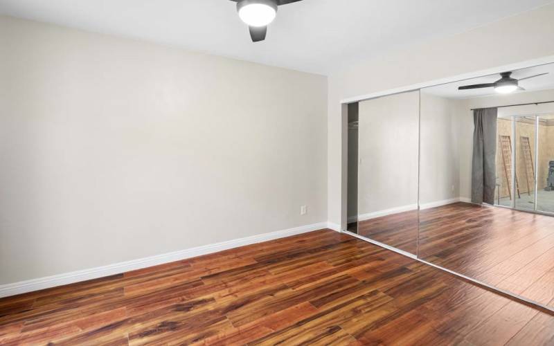 View of Down Stairs Bedroom with Mirror closet doors