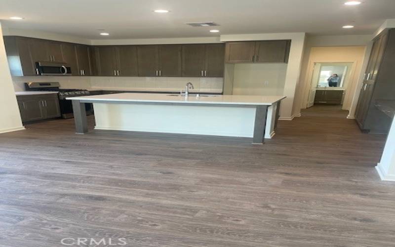 Shaker style maple cabinets with light grey finish.