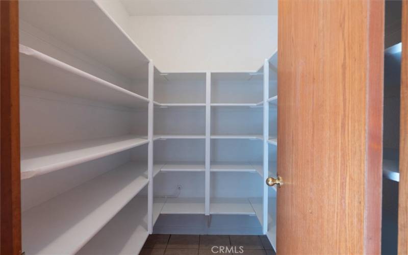 The large pantry room is conveniently near the kitchen.