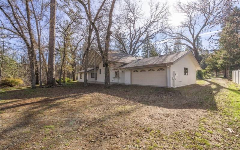 The back of the home where the garage entry is located.