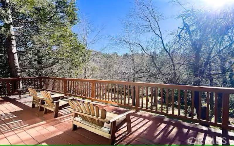 Private deck with tree line & mountain views