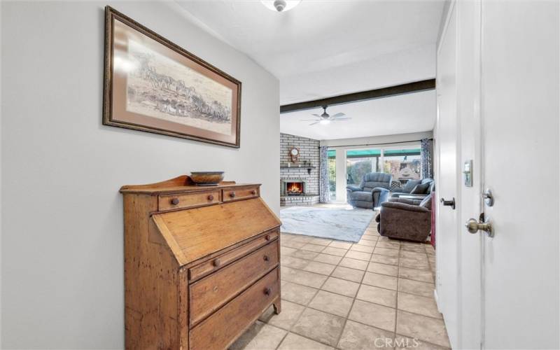 Beautiful tile at entry of home leading to living room.