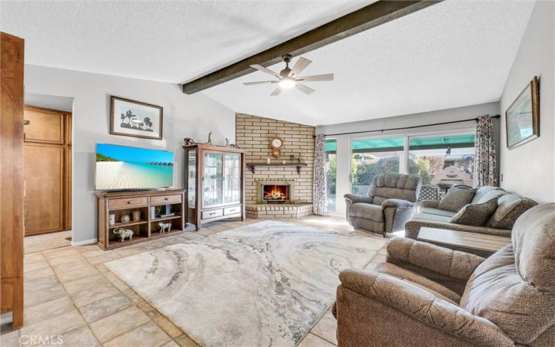 Living room with floor-to-ceiling brick fireplace