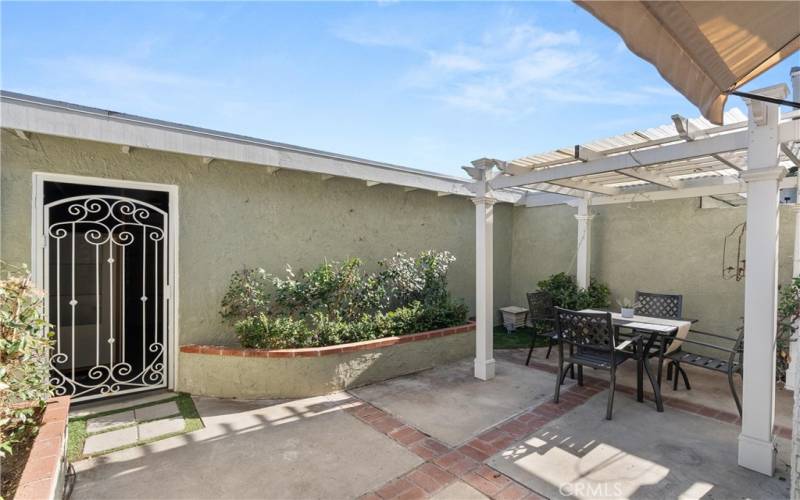 Private Patio with Access to 2 Car Garage