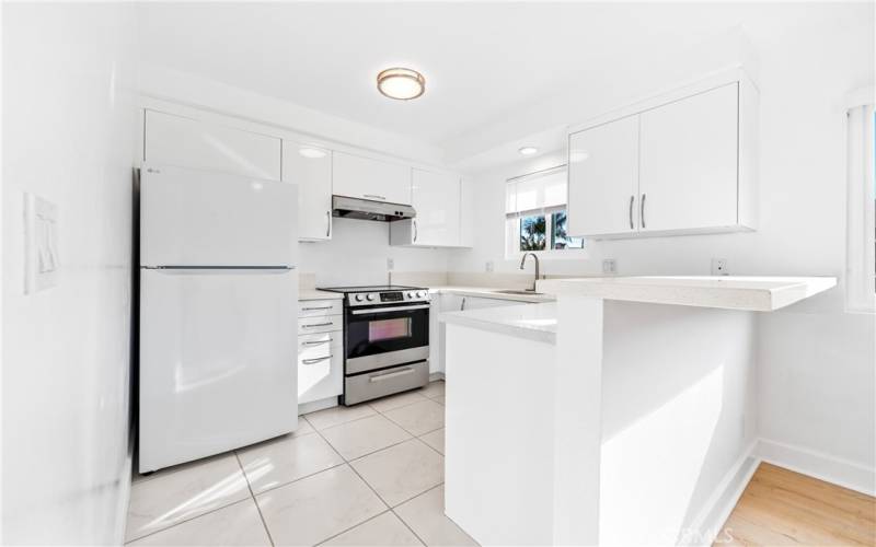 Kitchen w/new refrigerator, dishwasher