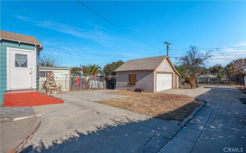 Rear view of lot with garage