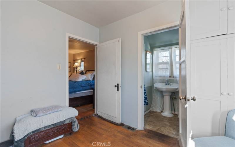 Dressing room with bathroom and master bedroom views