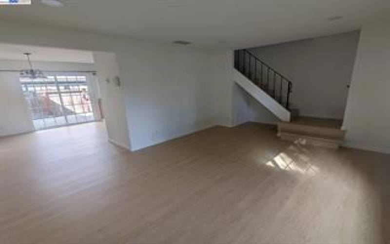 Livingroom and stair way with laminate wood steps