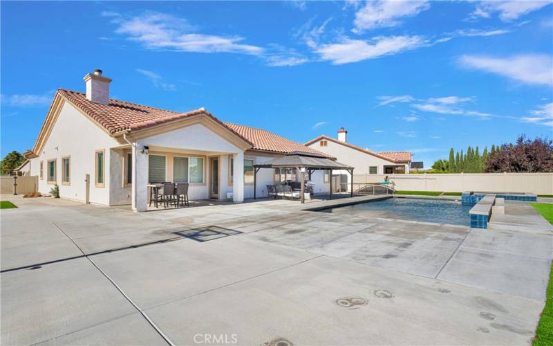 Large Backyard with Additional Concrete