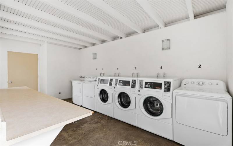 Laundry room is steps away.