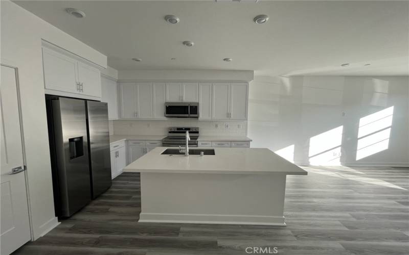 Open Floor Plan and Kitchen with modern appliances