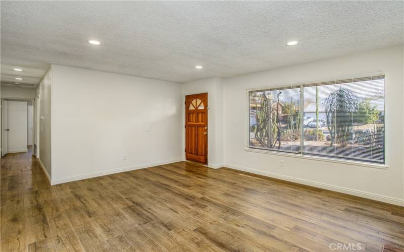 Bright Family room opens to back and side yards.