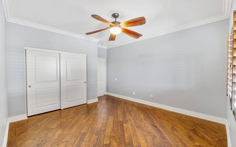 2nd photo of downstairs bedroom with view back toward the door