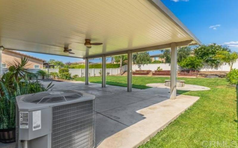 Huge Covered Patio with Ceiling Fans and Lighting; spa/jacuzzi area to the left of the patio