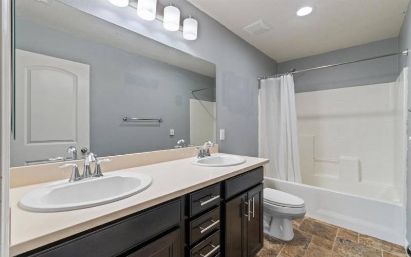 Hall Bathroom upstairs near Bedrooms 2 and 3 and Laundry Room