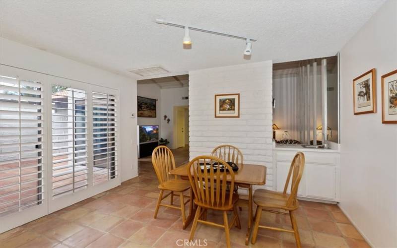 Large sliding door leading to the patio area.