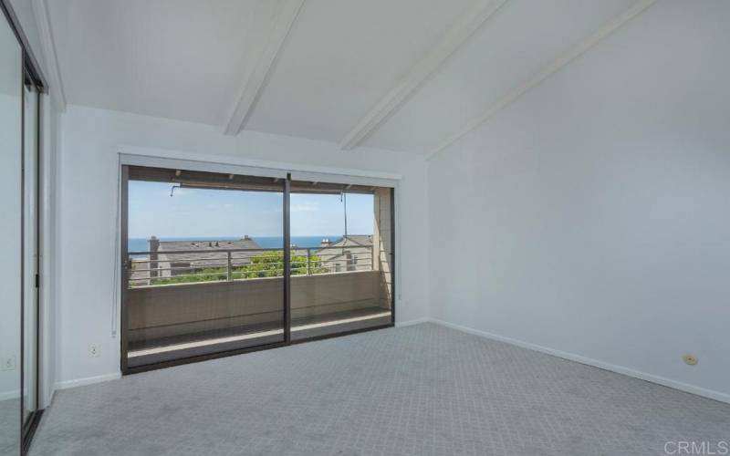 PRIMARY BEDROOM W/OCEAN VIEW DECK