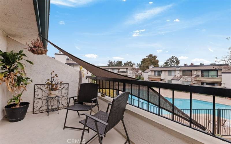 Your very own patio overlooking the pool. Peaceful