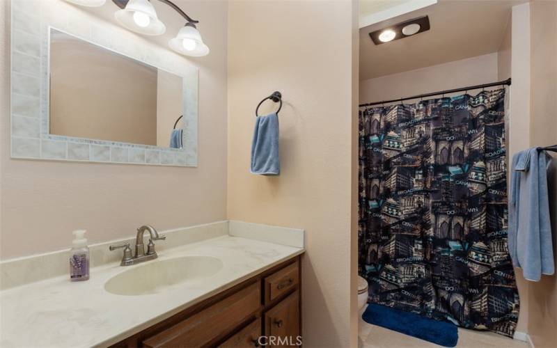 Bathroom 2 - tub/shower. Travertine floor