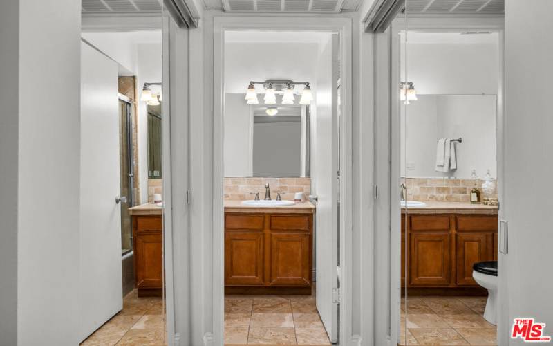 Mirrored closets in Main bedroom