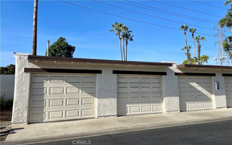 One car garage located on a corner location just outside plus a reserved parking space