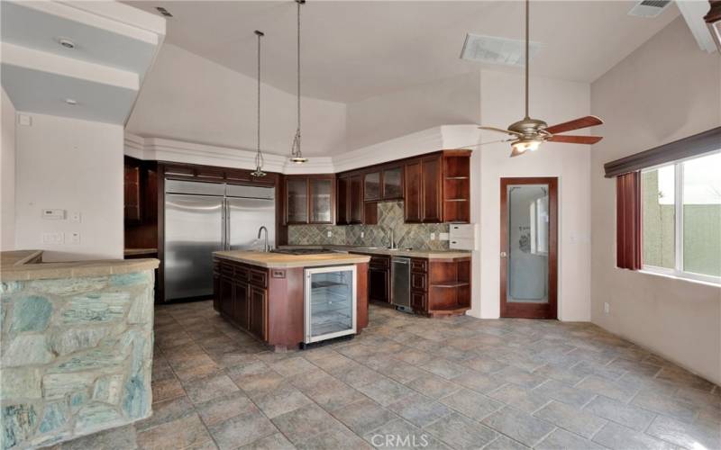 Breakfast Bar, Kitchen Island and Large Pantry/Laundry Room