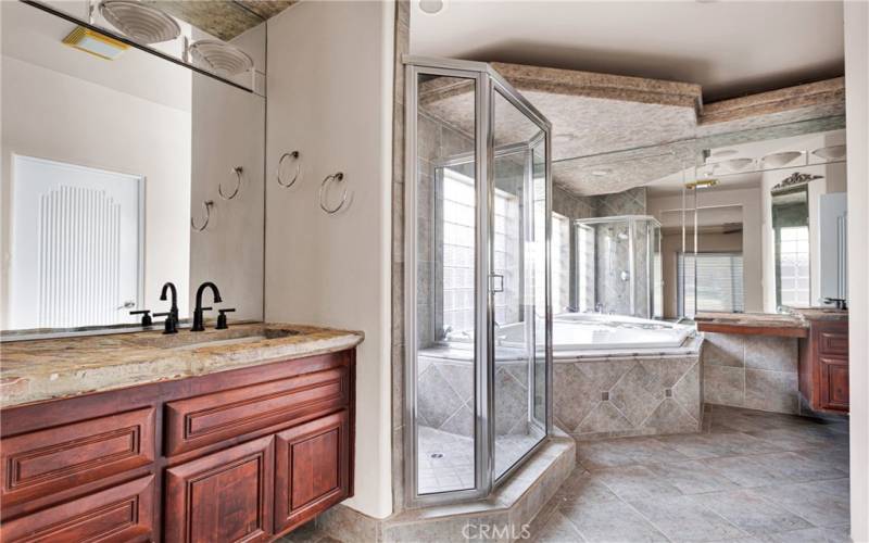 Primary Bathroom with two sinks, shower and​​‌​​​​‌​​‌‌​​‌​​​‌‌​​​‌​​‌‌​​‌‌​​‌‌​​​​ tub