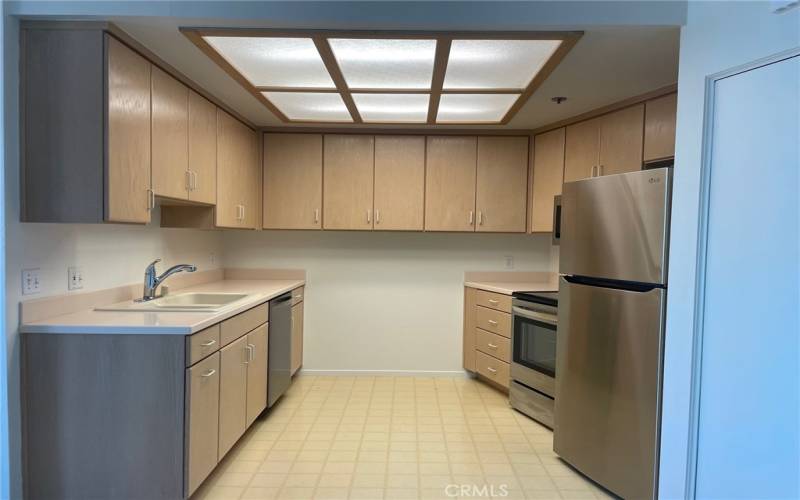 Galley Kitchen with Stainless Steel Appliances