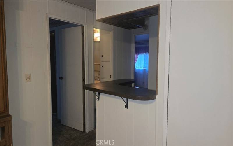 wet bar & door to guest bedroom & bathroom