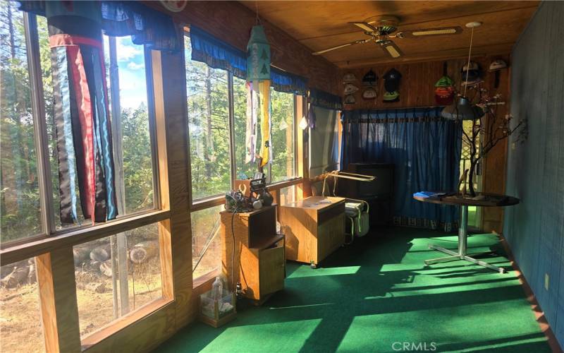 Enclosed side porch & access to front porch