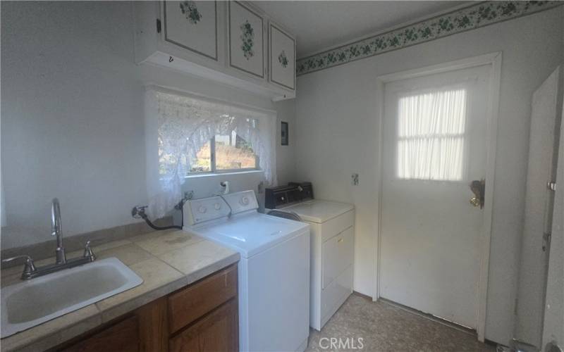 Laundry room with sink