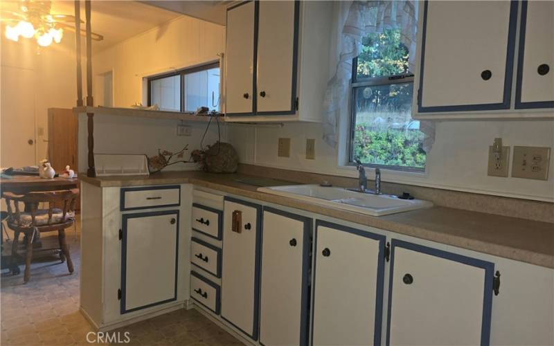 kitchen opens to dining room