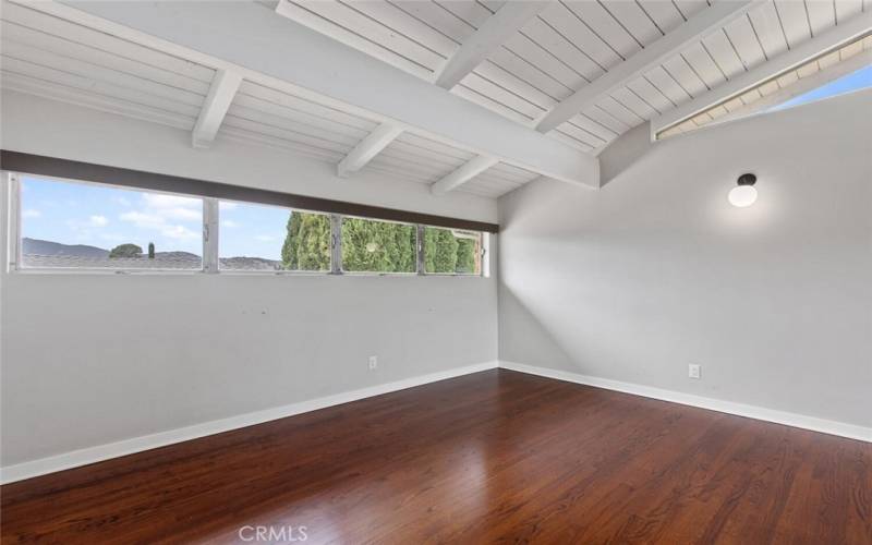 This is Bedroom #1 Primary with south-facing windows & lots of natural light