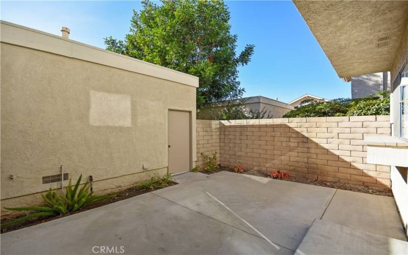 Patio yard - the door leads to your private 2 car garage