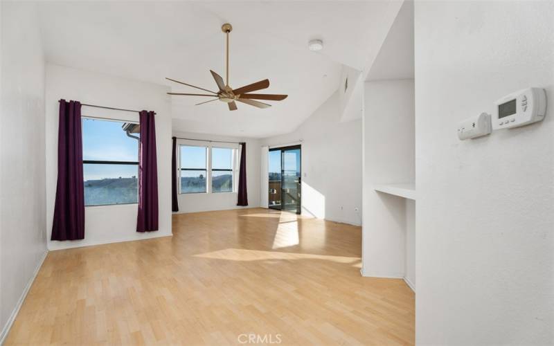 Living room with view towards the ocean.  Patio sliders on the right to provide access to quaint patio with ocean views.